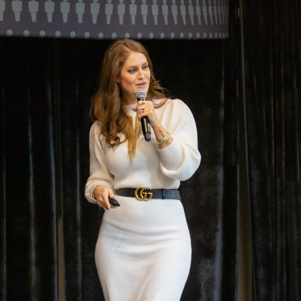 Dana Banks speaking on stage