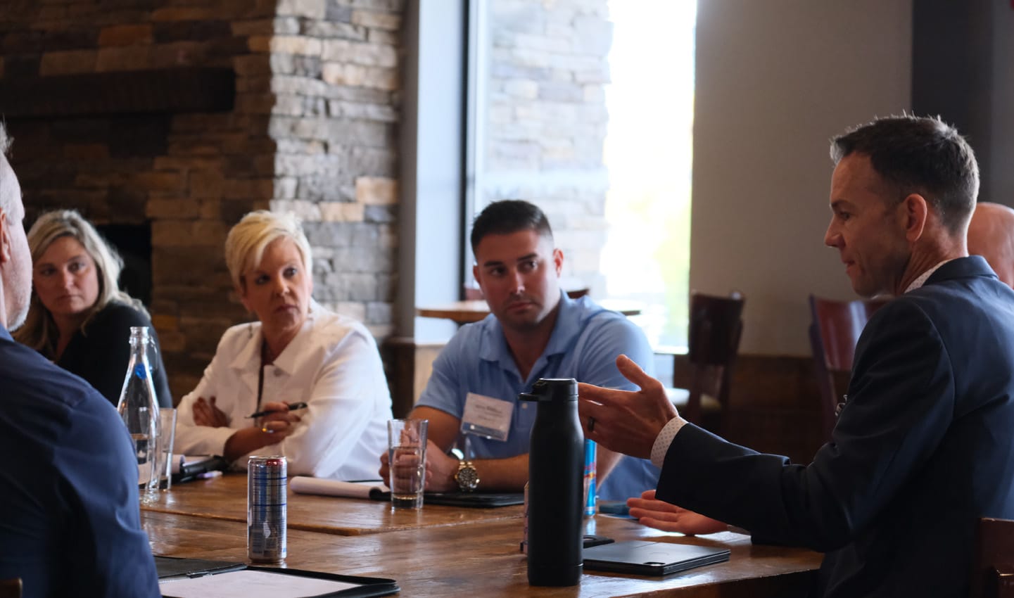Ron Alford conducting table talk at Southwestern Consulting's Elite Retreat